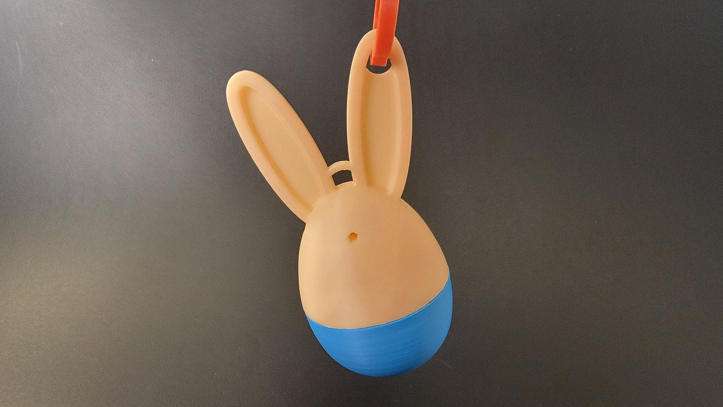 Hanging Easter egg scent container used in aerial scent detection competitions and training
