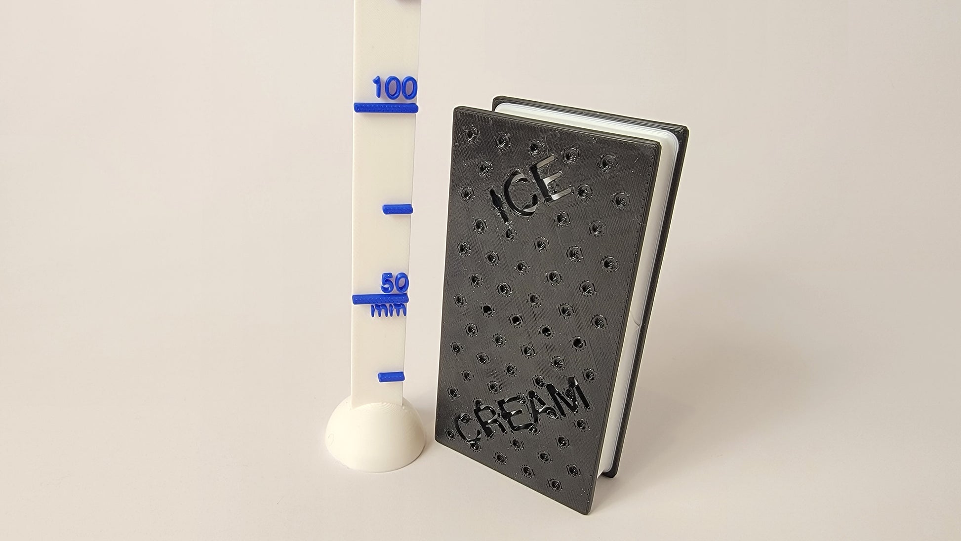 Ice cream sandwich nose work hide — side view showing scent container size