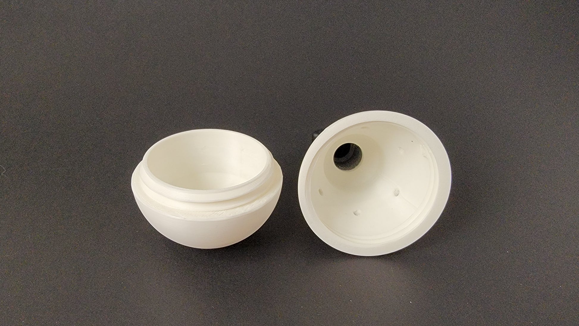 Light bulb hide showing scent vent and inside, nose work training container detail