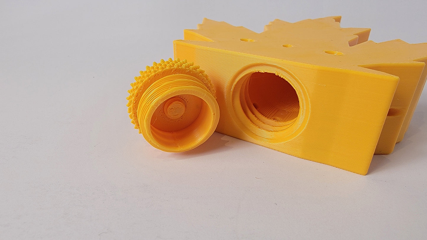 Close-up of maple leaf scent training container — ABS plastic nose work hide