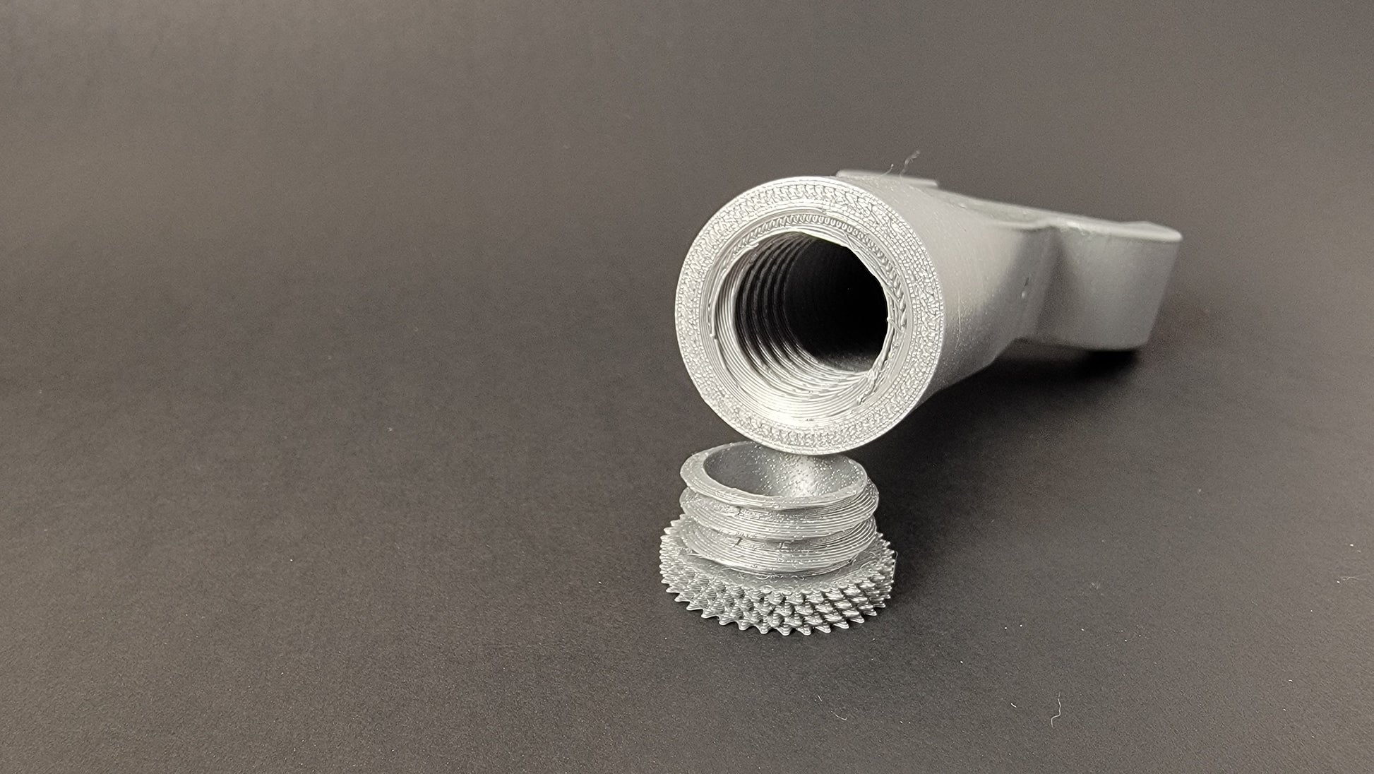 Close up of opening of hide of a wrench shaped scent container used in k9detection training