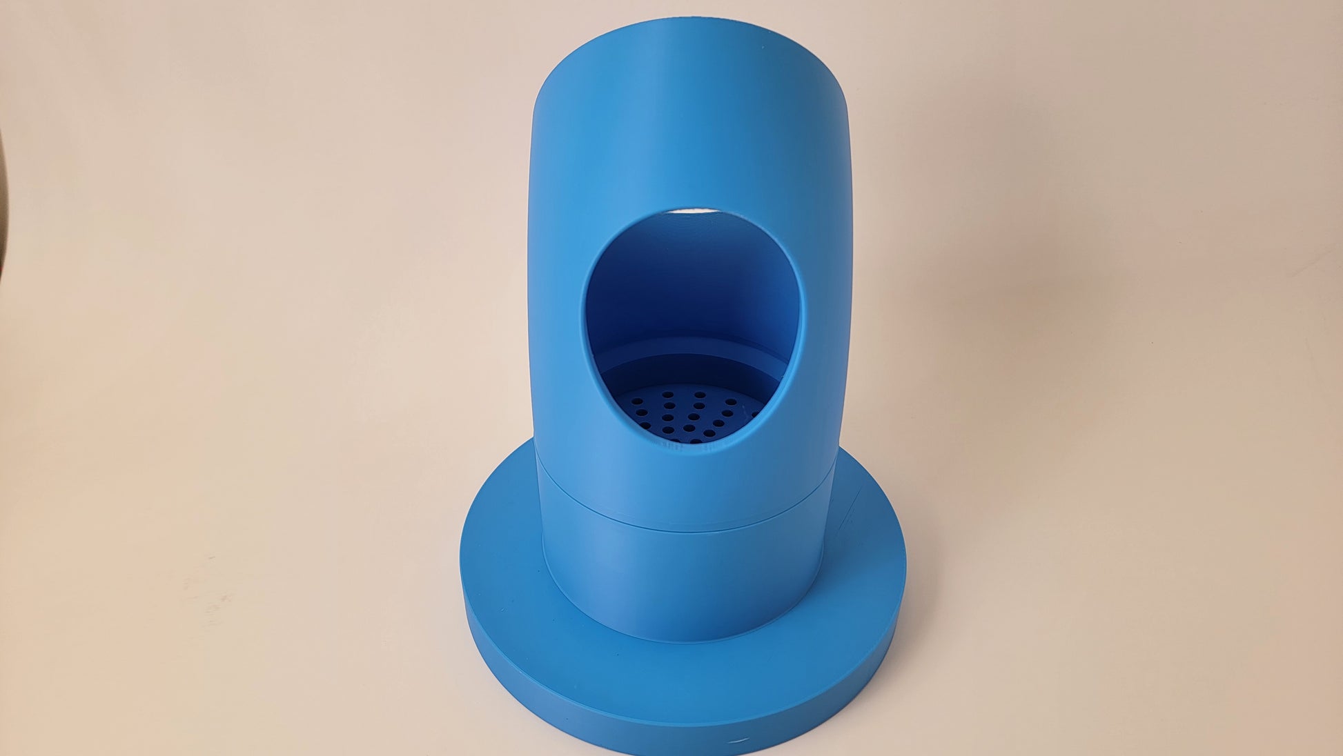 Rear hole for treat placement of a pairing pipe used in nose work training