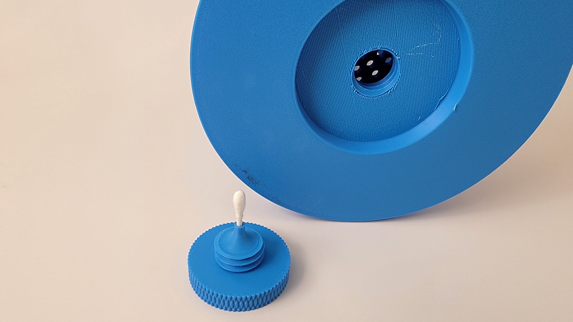 Close up of q tip holder of a scent pairing pipe used in K9 scent work training