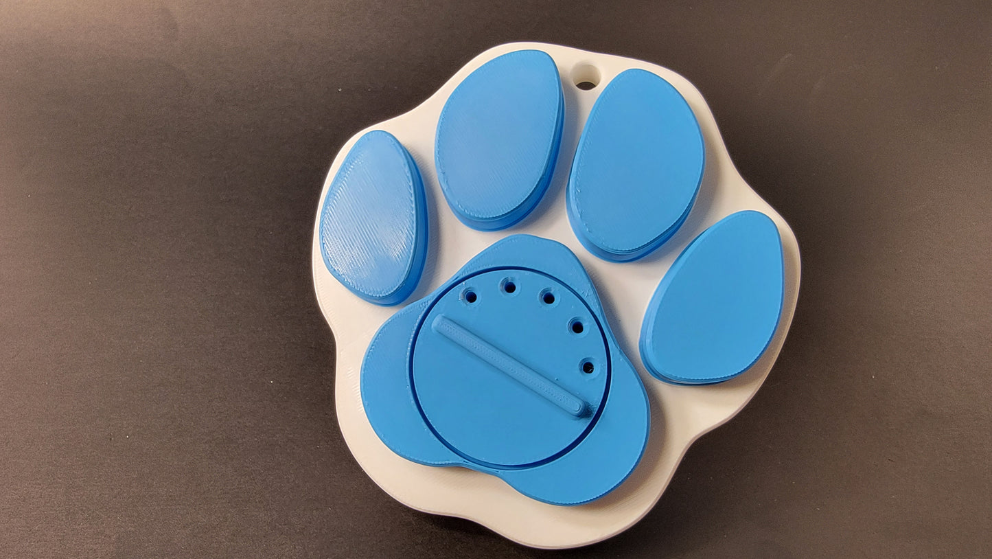 Cap of Paw print scent work hide.